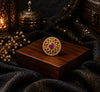 Circular Design Ring with Round Cut Red Stone